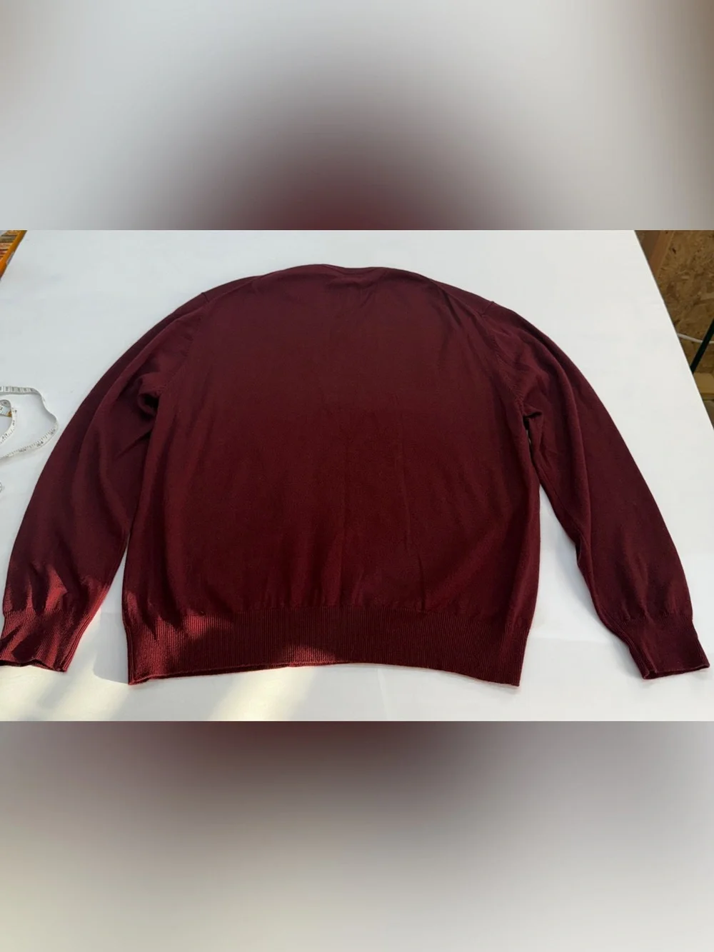 Men's V-Neck Sweater in Burgundy by Belford. Made of extra fine Merino Wool.